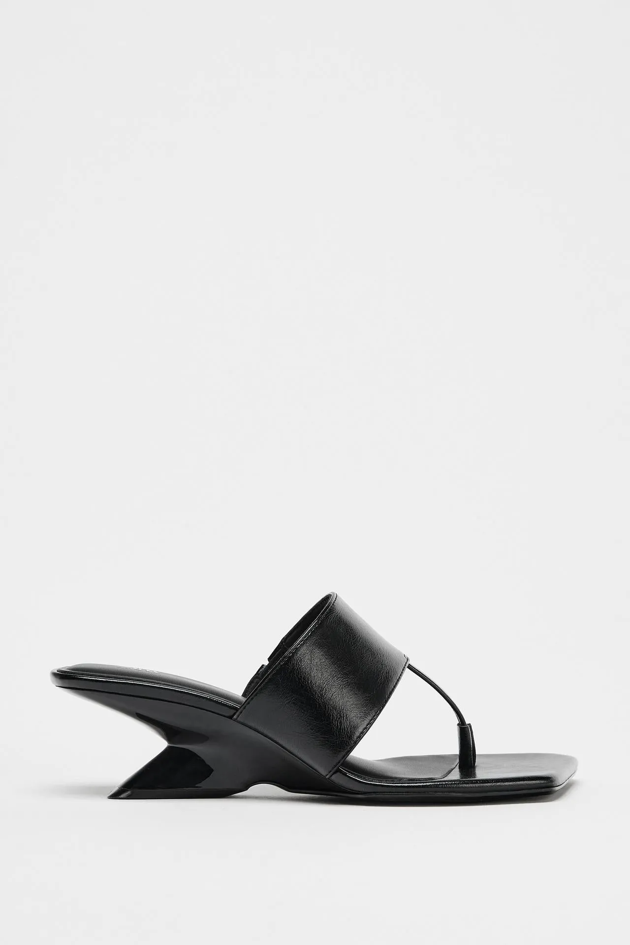 Asymmetric Wedge Heel
