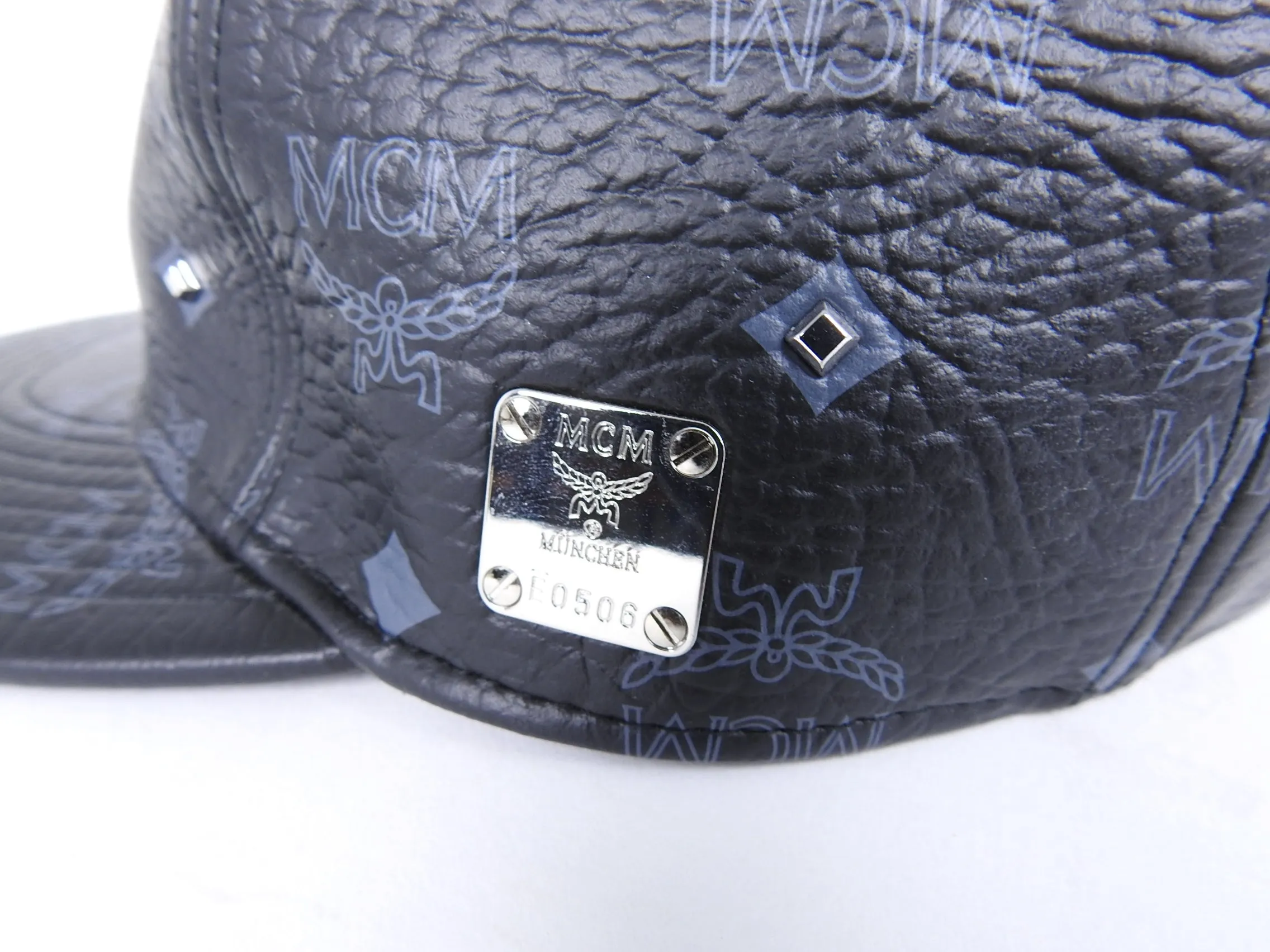 MCM Monogram Black and Gold Leather Strapback Cap